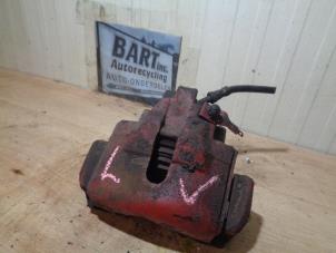 Used Front brake calliper, left Ford Cougar (ECX/W) 2.5 24V Price € 40,00 Margin scheme offered by Autorecycling Bart