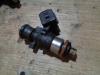 Injector (petrol injection) from a Renault Clio III (BR/CR), 2005 / 2014 1.2 16V 75, Hatchback, Petrol, 1.149cc, 55kW (75pk), FWD, D4F740; D4FD7; D4F706; D4F764; D4FE7, 2005-06 / 2014-12, BR/CR1J; BR/CRCJ; BR/CR1S; BR/CR9S; BR/CRCS; BR/CRFU; BR/CR3U; BR/CRP3 2006