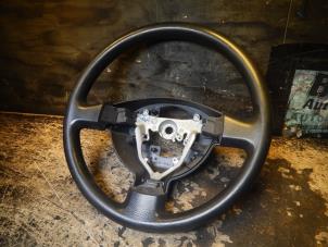 Used Steering wheel Daihatsu Cuore (L251/271/276) 1.0 12V DVVT Price € 20,00 Margin scheme offered by Autorecycling Bart