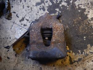 Used Front brake calliper, left Volkswagen New Beetle (9C1/9G1) 2.0 Price € 20,00 Margin scheme offered by Autorecycling Bart