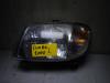 Headlight, left from a Daihatsu Cuore (L251/271/276), 2003 850, Hatchback, Petrol, 847cc, 31kW (42pk), FWD, ED20, 1994-08 / 1999-12, L501 1996