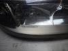 Headlight, right from a Renault Laguna II Grandtour (KG) 1.9 dCi 120 2005