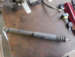 Used Rear shock absorber, left Nissan Note (E11) 1.4 16V Price € 20,00 Margin scheme offered by Autorecycling Bart