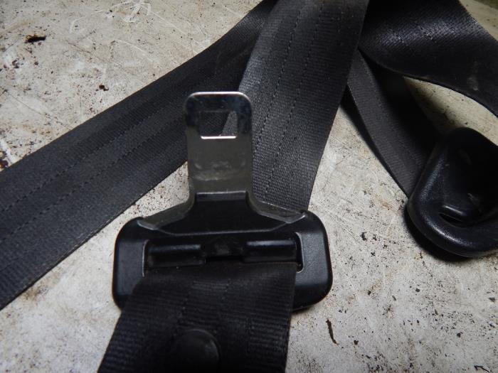 Front seatbelt, left from a Citroën AX 11 First,TGE Kat. 1995