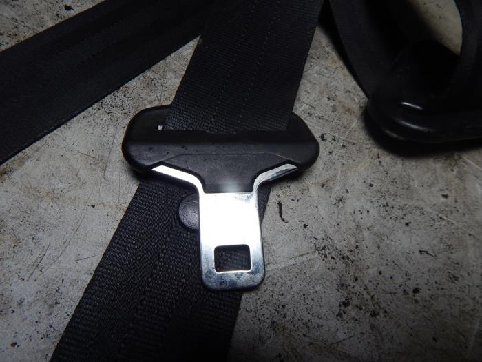 Front seatbelt, left from a Citroën AX 11 First,TGE Kat. 1995