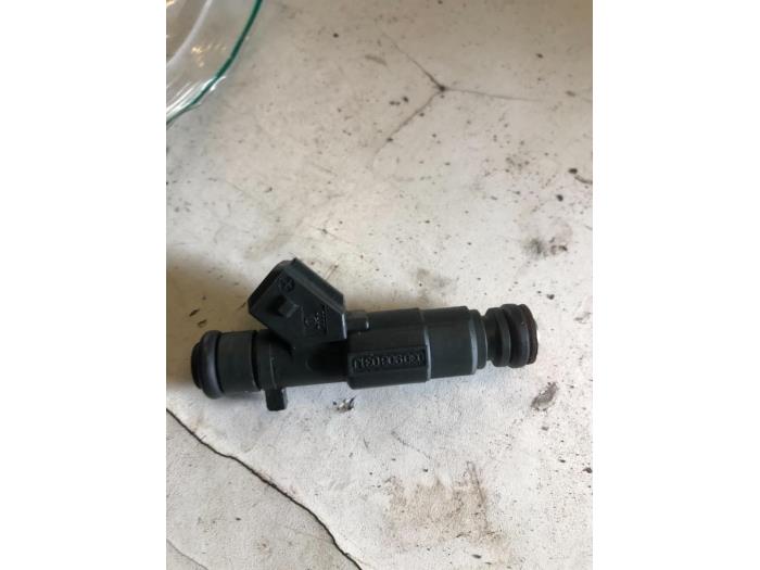 Injector (petrol injection) from a Volkswagen Lupo (6X1) 1.4 60 2001