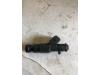Injector (petrol injection) from a Volkswagen Lupo (6X1) 1.4 60 2001