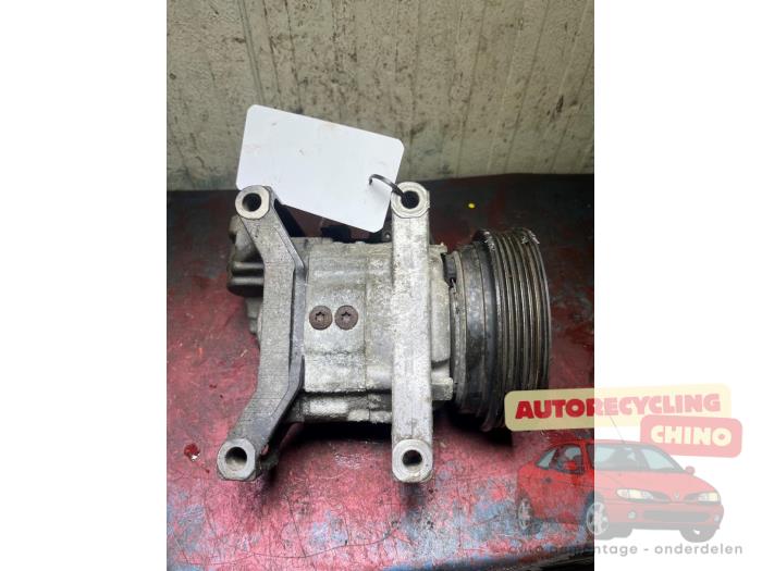 Usagé Pompe clim Nissan Micra (K11) 1.3 LX,SLX 16V Prix € 40,00 Règlement à la marge proposé par Autorecycling Chino B.V.