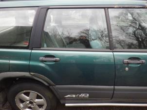 Used Rear door window 4-door door, rear right Subaru Forester (SF) 2.0 16V Price € 40,00 Margin scheme offered by Autorecycling Bart