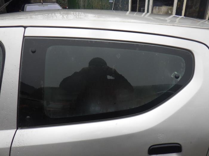 Rear door window 4-door, left from a Nissan Pixo (D31S) 1.0 12V 2009