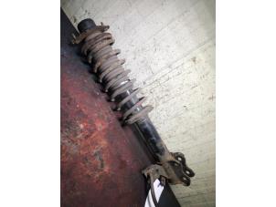 Used Fronts shock absorber, left Nissan Micra (K11) 1.3 LX,SLX 16V Price € 35,00 Margin scheme offered by Autorecycling Bart