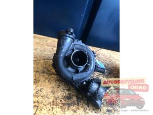 Turbo van een Ford Focus 2 Wagon 1.6 TDCi 16V 110 2005