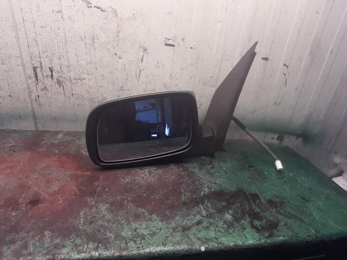 Wing mirror, left from a Daihatsu Sirion 2 (M3) 1.3 16V DVVT 2005