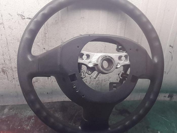 Steering wheel from a Daihatsu Sirion 2 (M3) 1.3 16V DVVT 2005