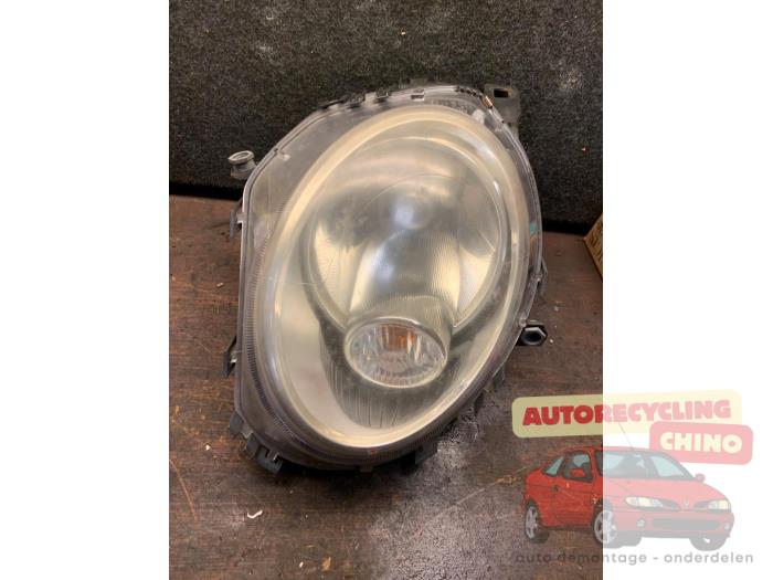Używane Reflektor lewy Mini Mini (R56) 1.6 16V Cooper Cena € 60,00 Procedura marży oferowane przez Autorecycling Chino B.V.