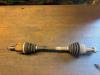 Opel Corsa D 1.4 16V Twinport Drivaxel, vänster fram