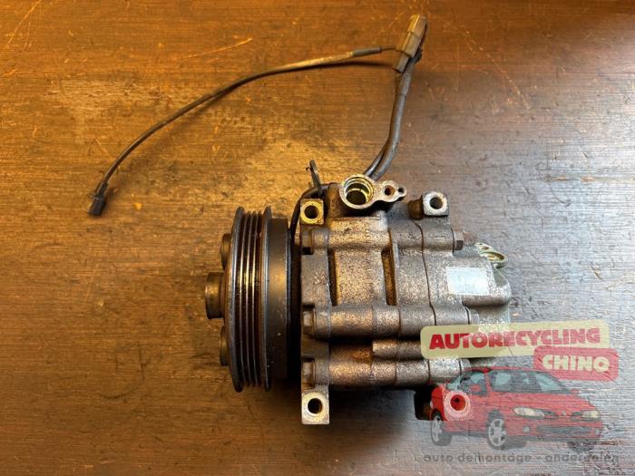 Usagé Pompe clim Mazda 323 P (BA15) 1.5i 16V Prix € 85,00 Règlement à la marge proposé par Autorecycling Chino B.V.