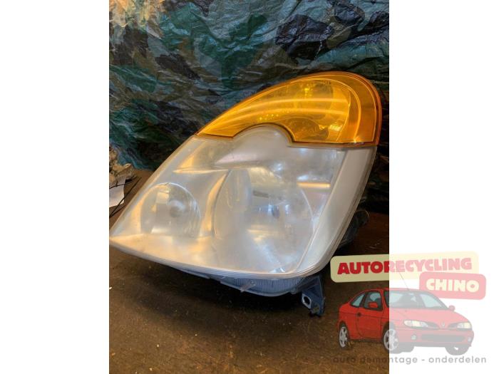 Używane Reflektor lewy Renault Modus/Grand Modus (JP) 1.4 16V Cena € 35,00 Procedura marży oferowane przez Autorecycling Chino B.V.