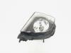 Fog light, front right from a BMW 3 serie Touring (E91) 318d 16V 2010