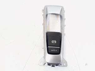 Usados Interruptor de freno de mano BMW X5 (F15) xDrive 40d 3.0 24V Precio € 66,00 Norma de margen ofrecido por GEJO Revisie & Onderdelen BV