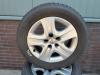Set of wheels + winter tyres from a Opel Insignia 1.4 Turbo 16V Ecotec