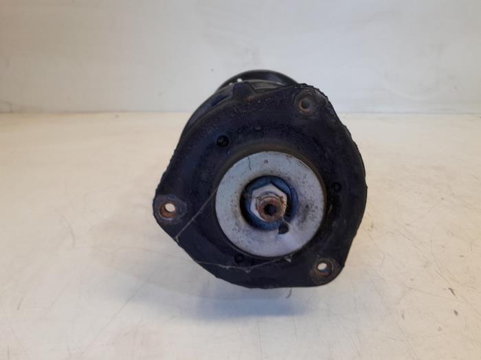Fronts shock absorber, left from a Volkswagen Touran (1T3) 1.4 16V TSI 140 2014