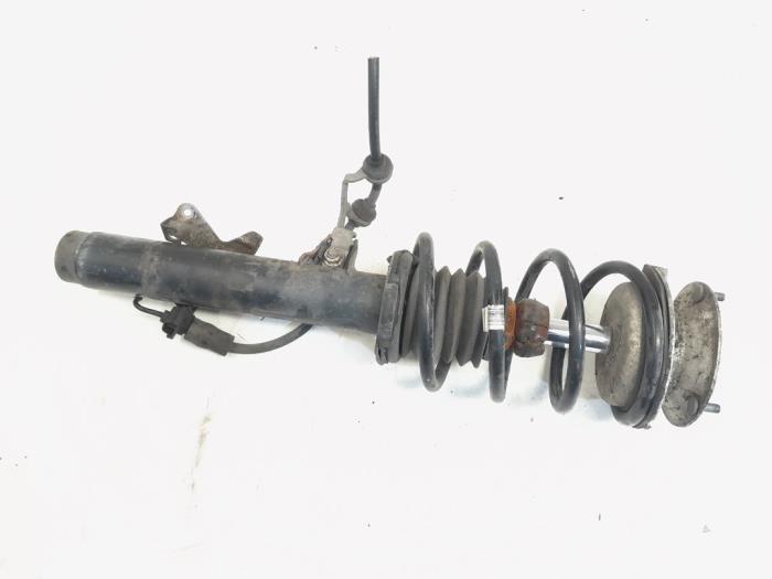 Fronts shock absorber, left from a BMW X1 (E84) sDrive 20d 2.0 16V 2010