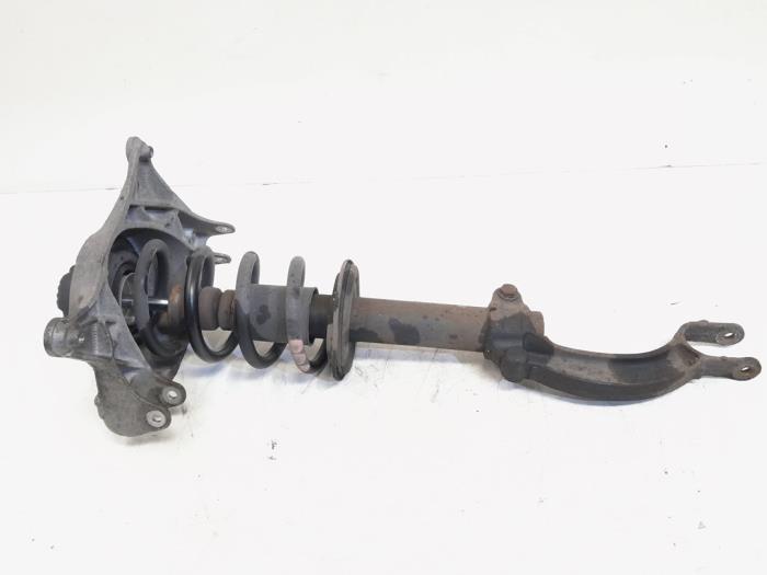 Fronts shock absorber, left from a Audi Q5 (8RB) 2.0 TFSI 16V Quattro 2008