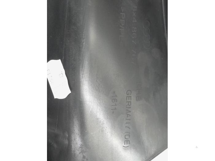 Side panel trim, rear left from a Audi A1 Sportback (8XA/8XF) 1.6 TDI 16V 2013