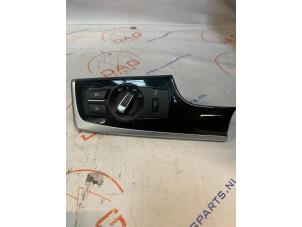 Usados Interruptor de luz BMW 5 serie (F10) 530d 24V Blue Performance Precio € 30,00 Norma de margen ofrecido por DagParts