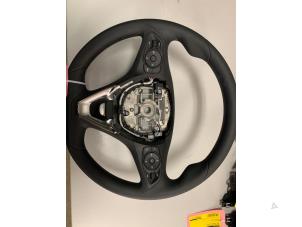 Used Steering wheel Opel Corsa F (UB/UH/UP) 1.2 12V 75 Price € 149,99 Margin scheme offered by DVZ Carparts