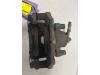 Front brake calliper, left from a Ford Fiesta 7 1.1 Ti-VCT 12V 75 2020