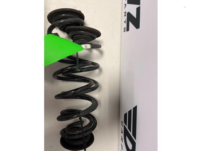 Rear coil spring from a Seat Leon Sportstourer (KLF) 1.5 eTSI 16V 2023