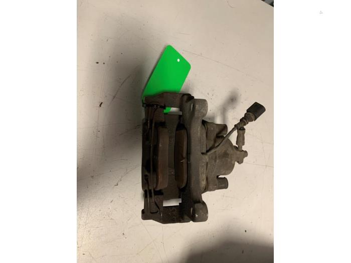 Front brake calliper, left from a Audi Q3 (8UB/8UG) 1.4 TFSI 16V 2017