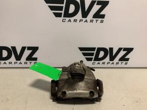 Used Front brake calliper, left Ford Fiesta 7 1.1 Ti-VCT 12V 75 Price € 42,35 Inclusive VAT offered by DVZ Carparts