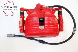 Used Front brake calliper, left Seat Leon (5FB) 2.0 TSI FR 16V Price € 120,00 Inclusive VAT offered by Duitse Auto Onderdelen