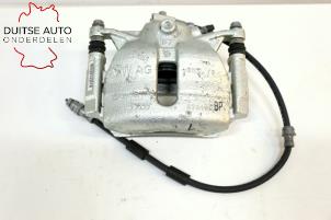 Used Front brake calliper, left Audi Q2 (GAB/GAG) 1.4 TFSI 16V Price € 99,99 Inclusive VAT offered by Duitse Auto Onderdelen