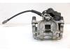 Rear brake calliper, left from a Volkswagen Golf VII (AUA), 2012 / 2021 1.4 TSI 16V, Hatchback, Petrol, 1.395cc, 110kW (150pk), FWD, CZDA, 2014-05 / 2021-03 2018