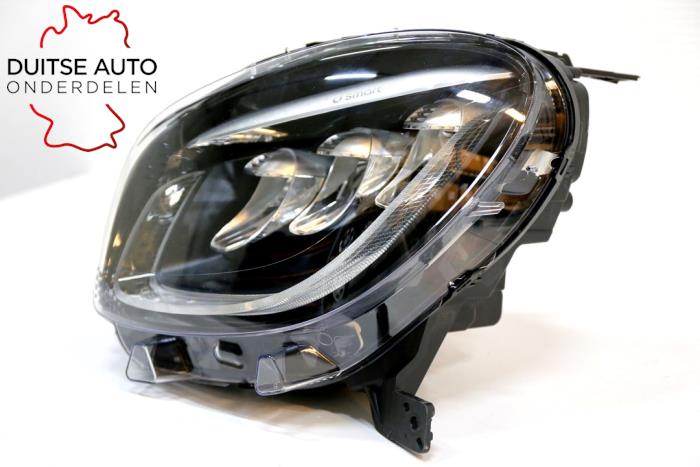 Headlight, left from a Smart Fortwo Coupé (453.3) 1.0 12V 2019