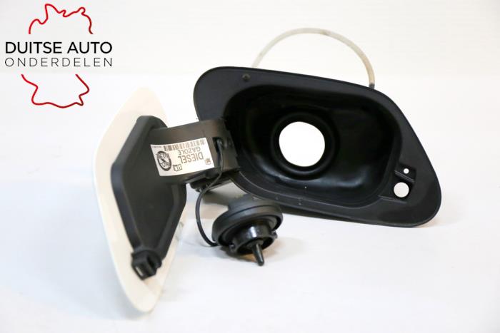 Tank cap cover from a Volkswagen Golf VII (AUA) 1.2 TSI 16V 2016