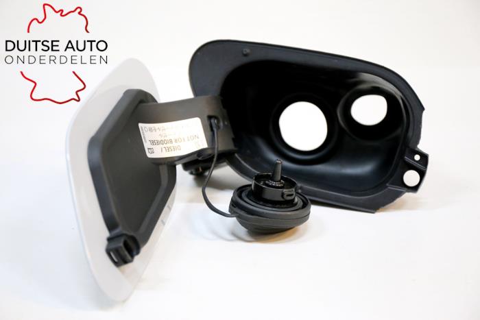 Tank cap cover from a Volkswagen Golf VII (AUA) 1.2 TSI BlueMotion 16V 2016