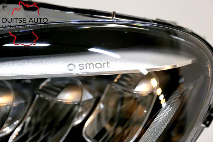 Headlight, left from a Smart Fortwo Coupé (453.3) Electric Drive 2019