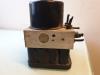 ABS pump from a Volkswagen Polo IV (9N1/2/3) 1.2 12V 2002