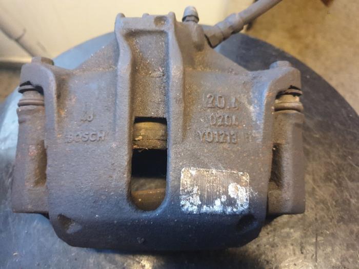 Front brake calliper, left from a Peugeot 206 (2A/C/H/J/S) 1.9 D 2002