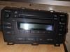 Radio/CD player (miscellaneous) from a Toyota Prius (ZVW3), 2009 / 2016 1.8 16V, Hatchback, Electric Petrol, 1.798cc, 100kW (136pk), FWD, 2ZRFXE, 2008-06 / 2016-06, ZVW30 2009