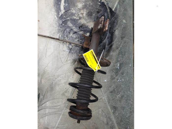 Shock absorber with coil spring