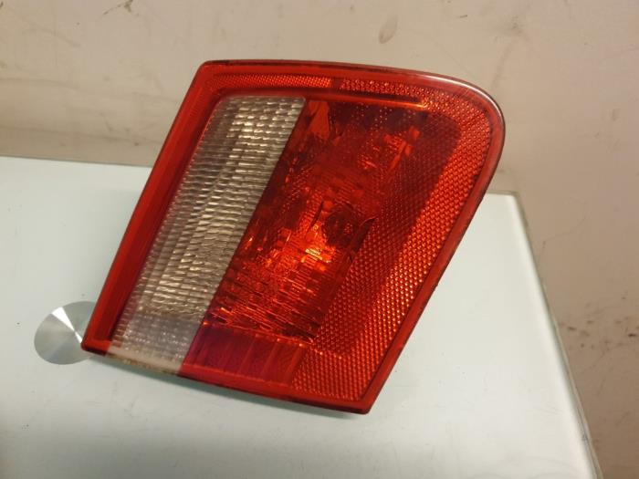 Tail light bulb cover holder