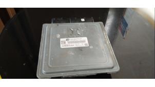 Engine management computer from a Volkswagen Touran (1T1/T2) 2.0 TDI 16V 170 2008