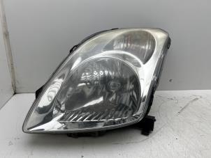 Used Headlight, left Suzuki Swift (ZA/ZC/ZD1/2/3/9) 1.3 VVT 16V Price € 50,00 Margin scheme offered by Autohandel & Demontage Weteringbrug