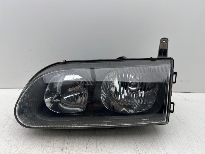 Używane Reflektor lewy Mitsubishi L-400 2.5 TD Cena € 30,00 Procedura marży oferowane przez Autohandel & Demontage Weteringbrug